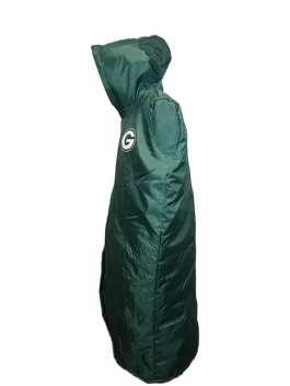 Close-up of an NFL cape coat highlighting the parachute material, snap-tab button closure, and viscose lining.