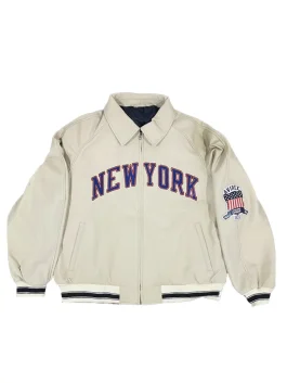 Front view of the Knicks Icon Jacket featuring the team logo and vibrant orange and blue colors.