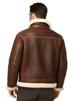 Close up of real leather material on Alex Brown shearling aviator jacket with smooth texture.