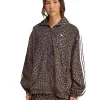 A stylish Adidas Leopard Firebird Oversized Track Jacket with a bold animal print and classic three stripes.
