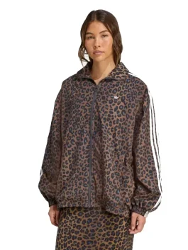 A stylish Adidas Leopard Firebird Oversized Track Jacket with a bold animal print and classic three stripes.
