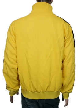 The back view of a yellow Death Bruce Lee Tracksuit highlighting the uniform fit and clean seams.