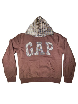 Detailed front view of the Gap houndstooth hoodie highlighting the rib-knitted cuffs and the round neck collar design.