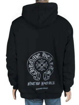 : Rear view of a black pullover hoodie on a mannequin featuring a large white horseshoe logo and gothic typography across the lower back.