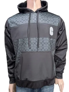 Front view of a classic Coach Hoodie featuring a signature logo and soft grey fabric.