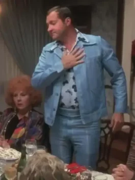 Randy Quaid wearing Cousin Eddie powder blue leisure suit during Christmas dinner scene