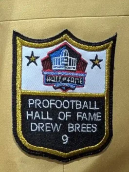 Gold sports jacket with premium embroidered details