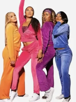 Four women posing in Cheetah Girls velvet tracksuit costumes in orange, pink, purple and blue on white background at J4Jackets