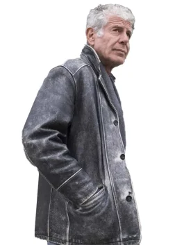 Close-up of Anthony Bourdain Leather Jacket showing the distressed leather texture and button-front style.