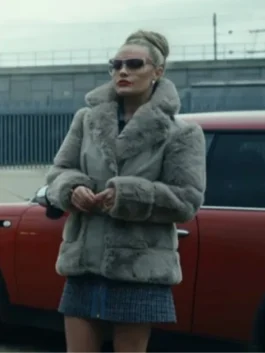 Chanel Cresswell as Sabrina wearing her chic winter fur jacket and sunglasses, showcasing the style from The Gentlemen TV series.