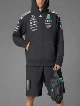 Full view of the Adidas Mercedes AMG Petronas F1 team pullover hoodie; black motorsport wear with front sponsor logos.