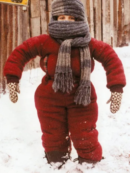A Christmas Story snow suit costume with Randy almost completely bundled up and struggling to move.