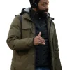 Robert "Skeet" Douglas in his Rob Peace 2024 Jacket outerwear; a stylish Green jacket layered over a vest.