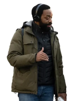 Robert "Skeet" Douglas in his Rob Peace 2024 Jacket outerwear; a stylish Green jacket layered over a vest.