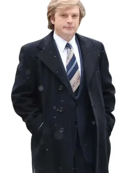 Sebastian Stan trench coat in a dark color with a wide collar, portraying Donald Trump in the film.