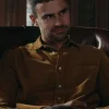 Theo James Brown Shirt Horniman in his brown button up shirt from The Gentlemen, showcasing a serious, thoughtful expression.
