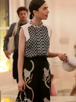Lily Collins wearing a colorful geometric floral printed blouse in Season 5.