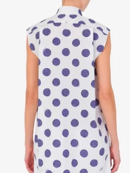 Back view of the polka dots poplin top worn by Lily Collins on screen.