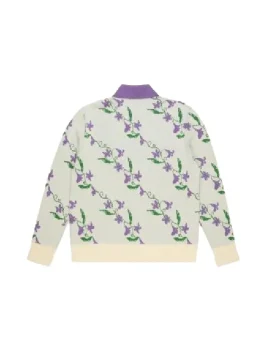 The back view of the purple floral cardigan worn by Samuel Arnold as Julien in Emily in Paris Season 5.