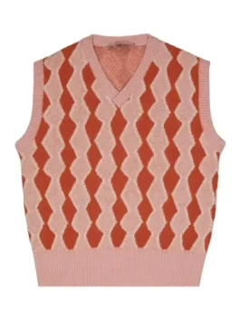 A front view of Samuel Arnold in a pink V-neck Sweater Vest with a ribbed trim and tailored fit.