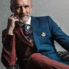 Jordan Peterson suits style in a sharp formal look with clean tailoring.
