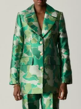 Samuel Arnold as Julien in the iconic kelly green afro camo jacket from Emily in Paris.