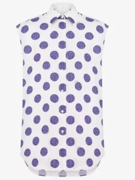 Front view of Lily Collins in a stylish polka dots poplin top with a neat collar.