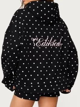 Back view of black polka dot hoodie. Relaxed slouchy fit and premium fleece fabric by J4 Jackets.