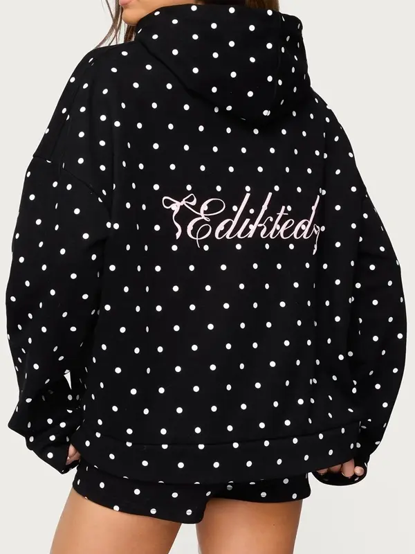 Back view of black polka dot hoodie. Relaxed slouchy fit and premium fleece fabric by J4 Jackets.