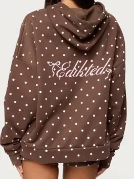 Back view of brown and cream spotted hoodie. Comfortable drop-shoulder design and soft fleece by J4 Jackets.
