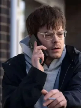 Charlie Heaton wearing the signature Industry 2026 jacket in a premium charcoal finish with a high-status tailored silhouette.