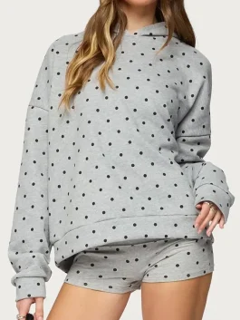 Front view of grey Chelsie polka dot hoodie. Modern heather grey with white spots and a cozy oversized fit.