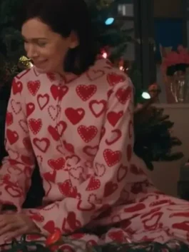 Close-up of Elsbeth S02 Carrie Preston heart jacket showing heart detail, stitching, and smooth fabric finish