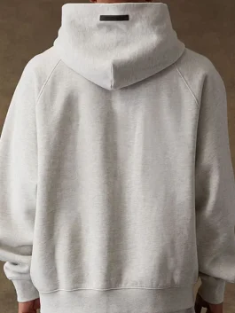 The back view of a Fear of God Light Grey Hoodie showing the clean finish and hood shape.