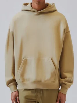 A soft Fear Of God Essentials Pullover Hoodie with a cozy fleece interior.