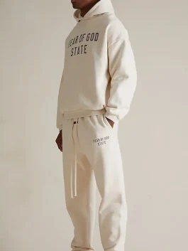 A relaxed Essentials Cream Hoodie designed for a clean men's streetwear look.