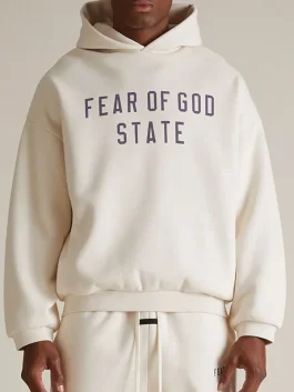 Front view of the Essentials Cream Hoodie showing the minimalist chest branding.