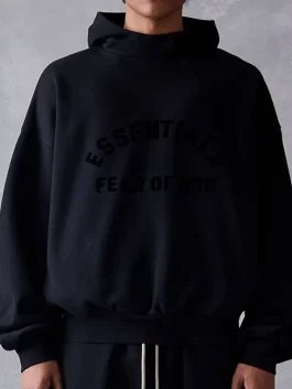 Front view of the Essentials Jet Black Hoodie featuring a clean kangaroo pocket.