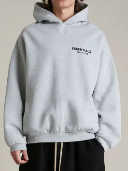 Front view of the Essentials Light Heather Grey Hoodie with a clean kangaroo pocket.