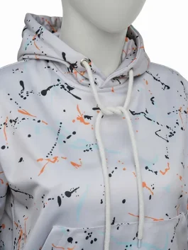 Close-up of Kim Fields splatter hoodie showing fabric texture, paint splatter detail and neat stitching finish