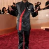 A formal Golden Globe Awards Snoop Dogg Suit in black for a timeless red carpet style.