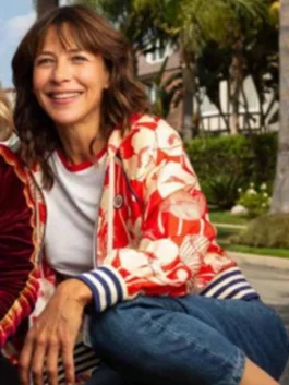 Floral Printed Jacket showcasing a brilliant multi-colored botanical aesthetic and a modern, comfortable athletic cut for women.