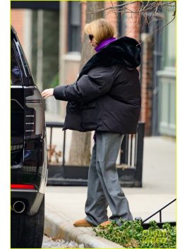 Jennifer Lawrence wearing her famous oversized puffer coat during a 2026 outing in NYC.