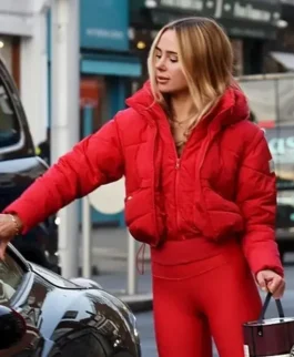 Front view of Kimberley Garner red hooded puffer jacket showing quilted style, zip front and winter-ready fit