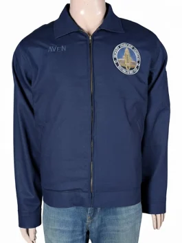 Chris Pratt wearing a navy blue cotton jacket with a shirt collar and official patch in a scene from the 2026 movie Mercy.