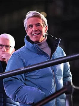 High-gloss blue puffer jacket inspired by Andy Cohen New Year's Eve 2026 with YKK zip and stand collar.