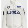 Direct front view of the 2026 Team USA white graphic puffer with a secure mock neck collar.