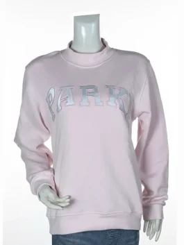 Close-up of a red fleece sweatshirt showing the mock neck collar, rib-knitted cuffs, and white varsity-style embroidery.