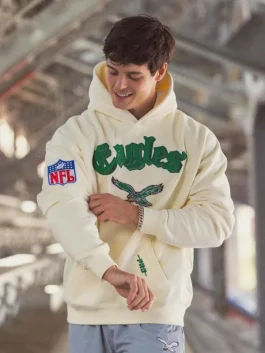 Philadelphia Eagles cream hoodie front view showing soft fleece style, pullover hood and relaxed fit for daily wear
