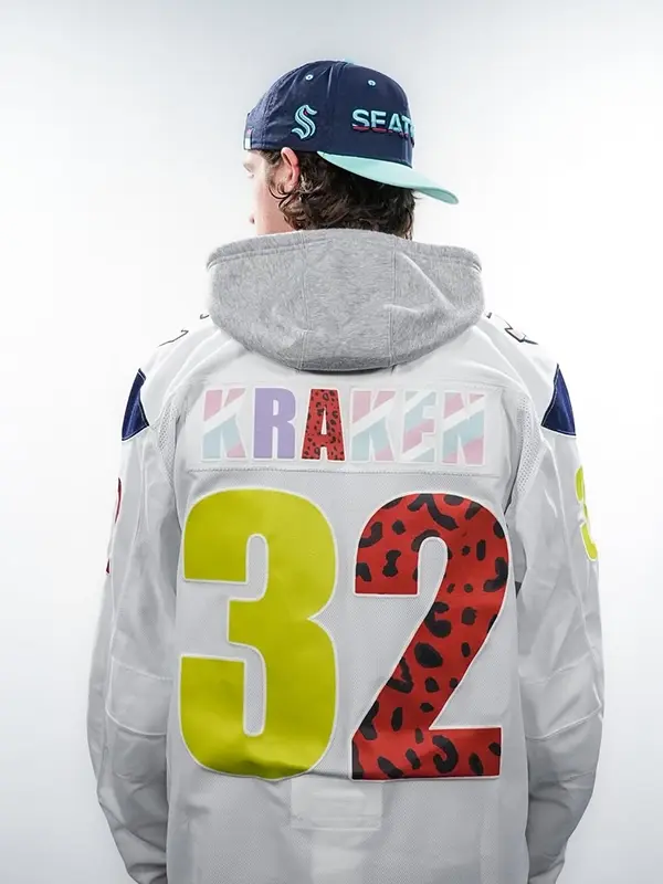 Standard back view of the navy Seattle Kraken Pride Jersey showing the high-quality nameplate area and colorful accents.